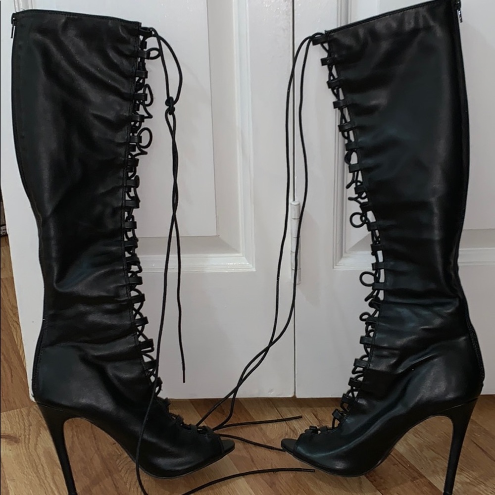 Lace up knee high heel boot